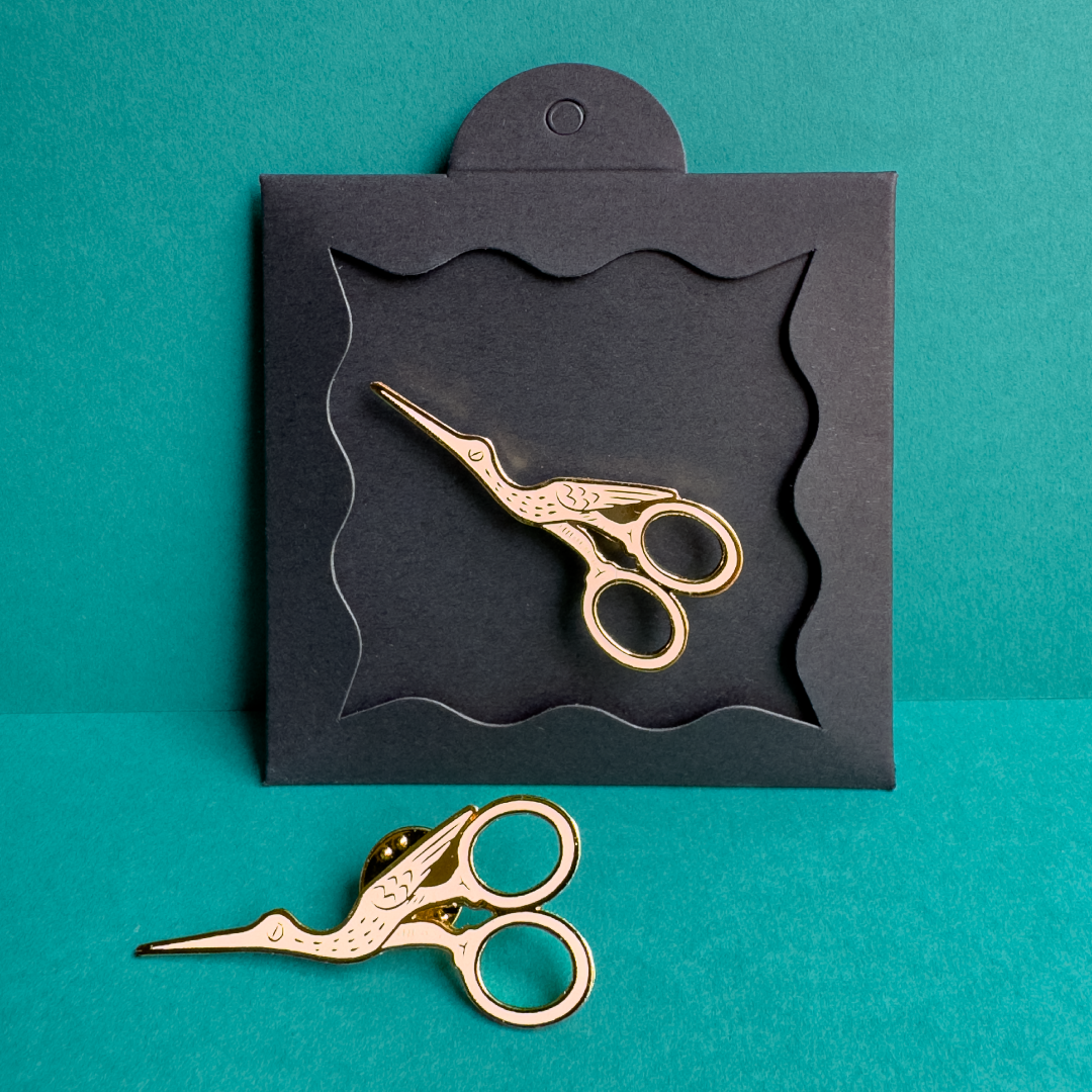 PIN TIJERAS Cigüeña